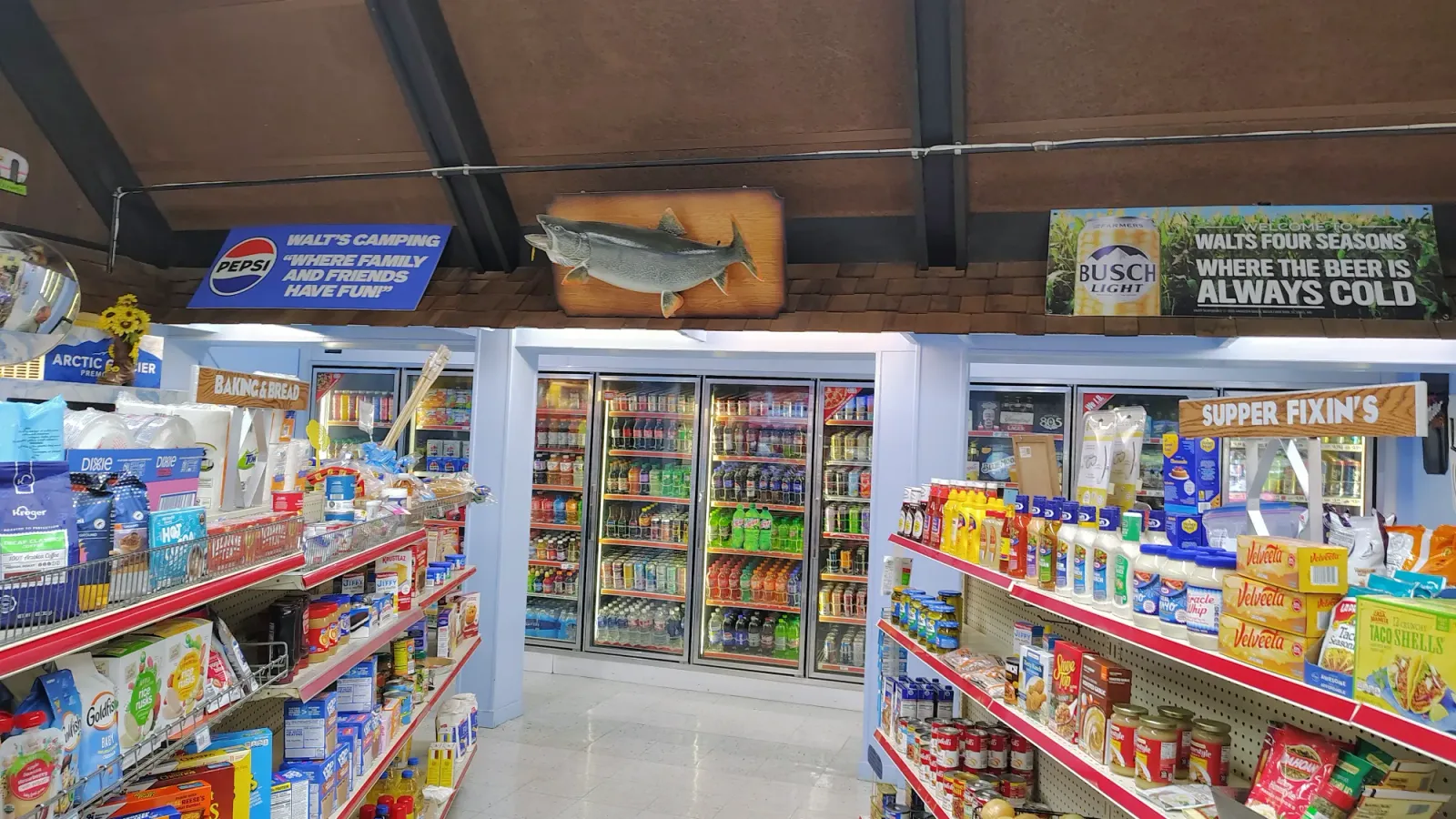 Convenience store aisles stocked with snacks and drinks