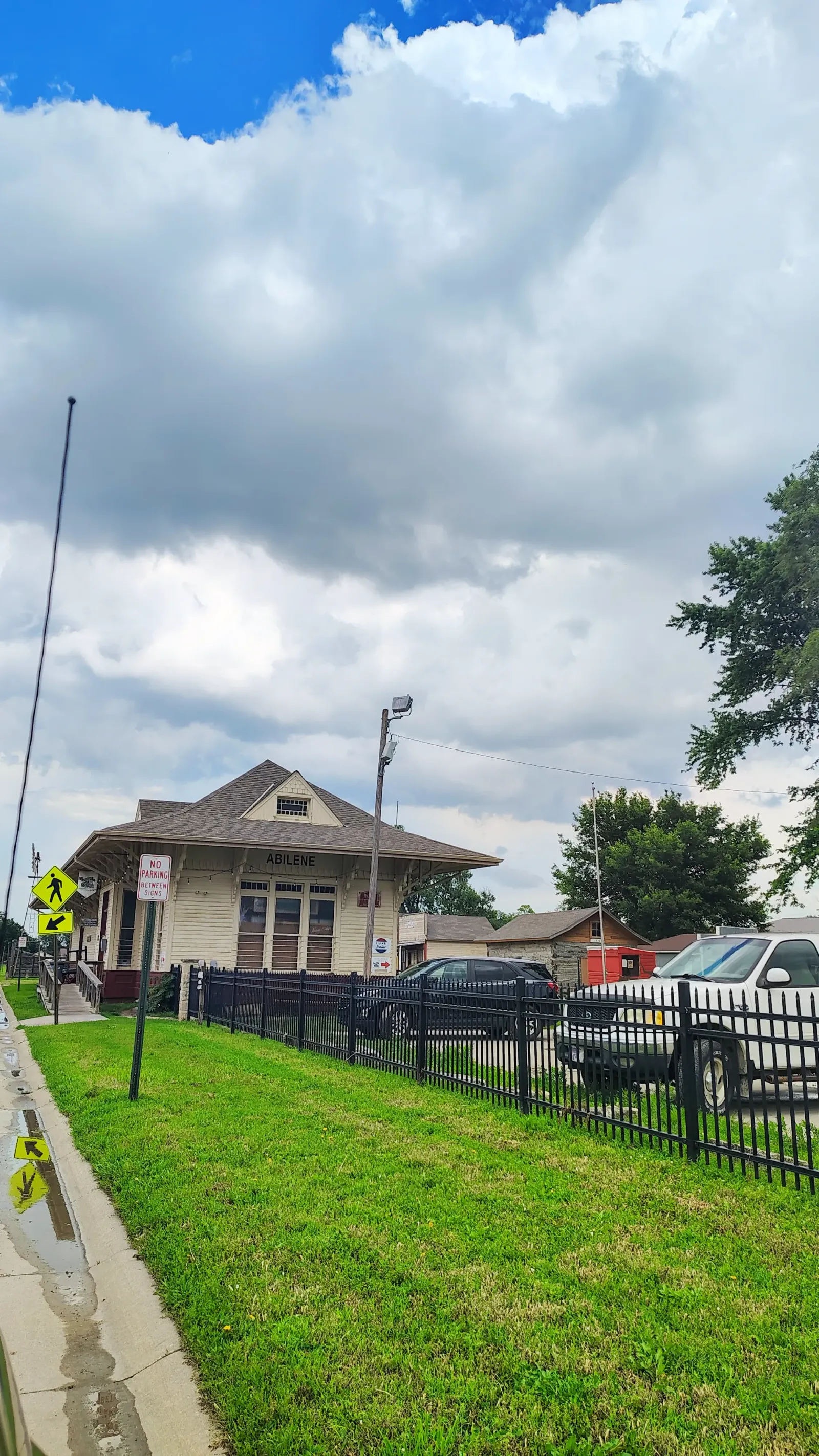 Historic train station building along a street in Abilene Kansas